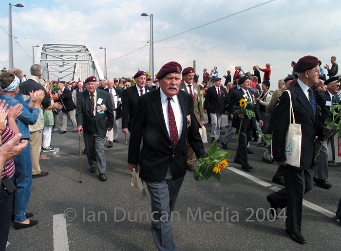 ANNIVERSARY... Veterans marched shoulder to shoulder across the bridge as part of the commemorations and some were driven over the Rhine in restored Second World War military vehicles...