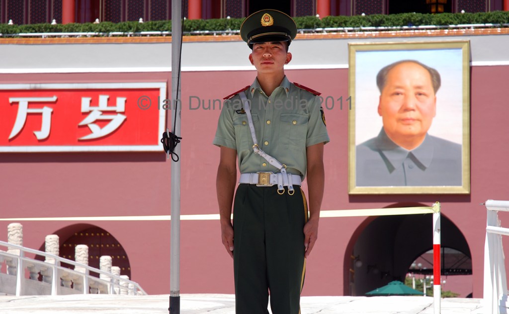 TIANANMEN SQUARE… Guard duty under the watchful gaze of Mao Zedong in Beijing in China…