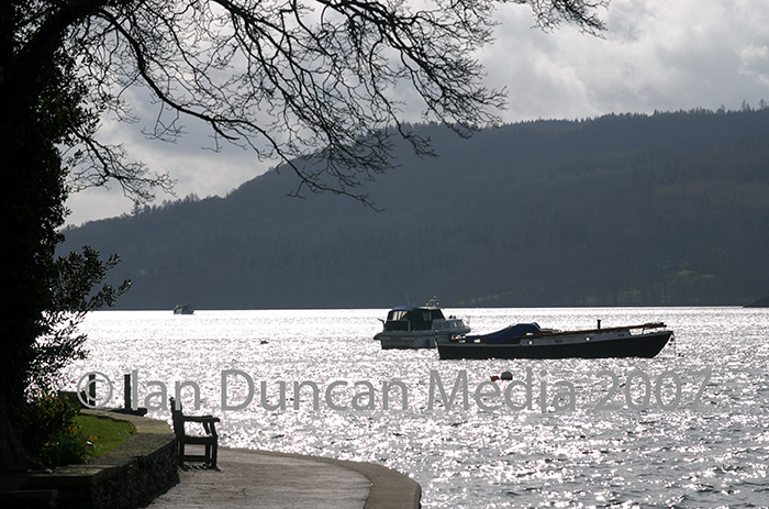 LAKE... Boats moored on Windermere in the Lake District which is a tourist magnet...