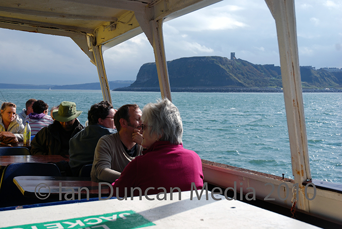DAILY TRIPS ... sailing north with Scarborough Castle in the background...