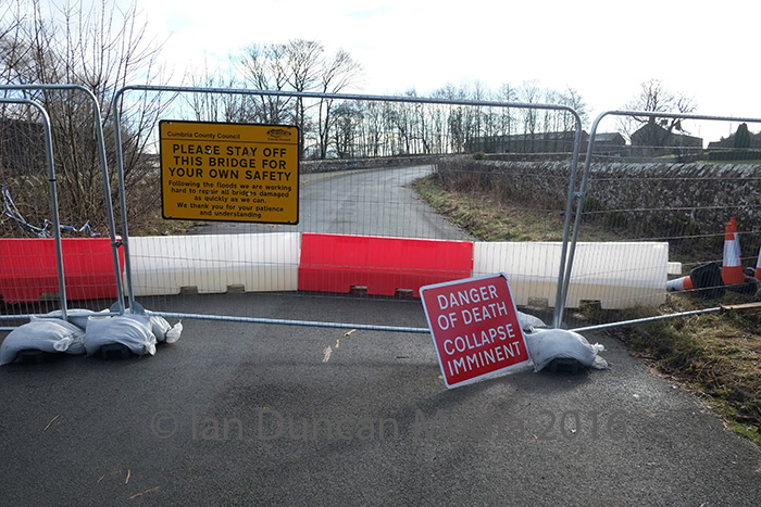 DANGER TO LIFE... Warning signs and barriers at Brougham Old Bridge, which authorities say may collapse at any time...
