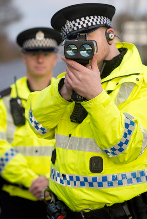 SPEED CHECK... Police Scotland officers with speed camera equipment in the Highlands...