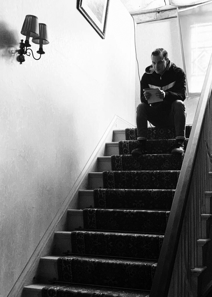 SCRIPT... Nicholas Ralph learning his lines on set before he got into costume... 