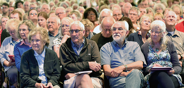TIME FOR REFLECTION... Worshippers at Keswick Convention, which traders say should not be held wholly during the school holidays...