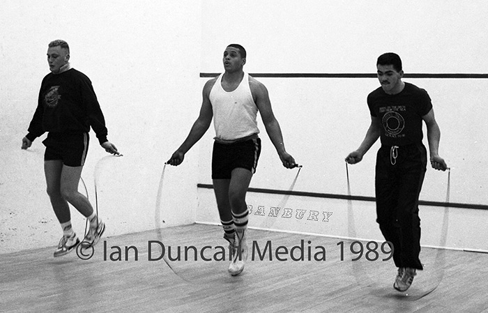 TRAINING... Super heavyweight boxer John Harewood, centre, training in the squash courts in Washington...