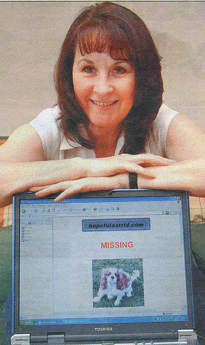 LOGGED ON... Margaret Nawrockyi, of New Barnetby, with her computer logged on to the website she set up to help trace her lost spaniel Astrid...