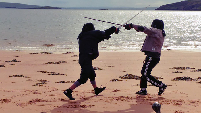 EN GARDE... Members of the HEMAH group in outdoor action on the beach at Coigach beach near Ullapool in Wester Ross...