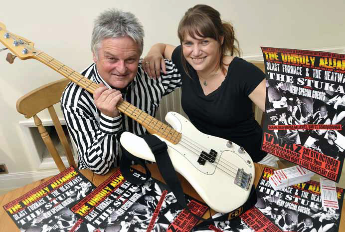 FUNDRAISER... Kevin Allen and daughter Jodie prepare for a charity gig after her successful double transplant operation...
