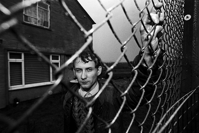 THEY SHALL NOT PASS... Paul Stephenson checks the 10ft high fence around his Walney home. The original photo which appeared on the front page of the North West Evening Mail...