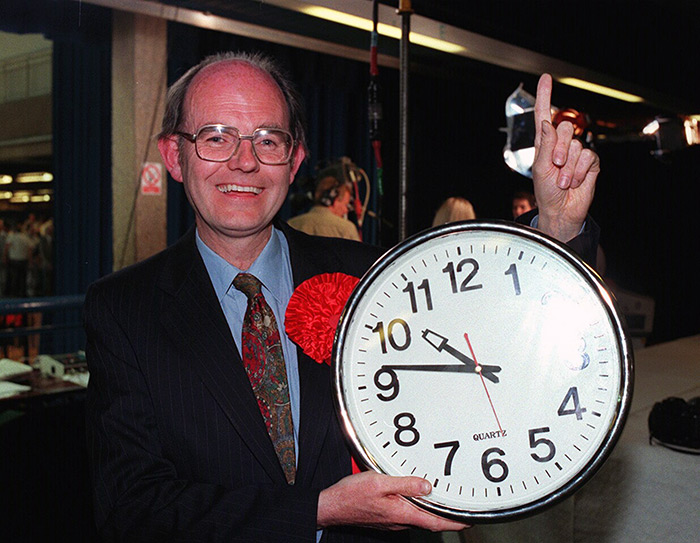 FIRST MAN IN... Chris Mullin with the clock recording the moment his victory in Sunderland south was declared, returning him as MP for the constituency. The declaration was madden record time for Britain and heralded a succession of Labour victories...
