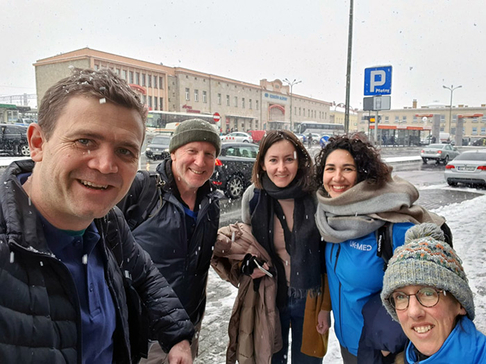 HERE TO HELP... Andy Kent, second from left, in Lviv during his last visit...