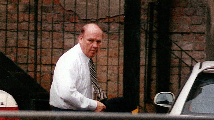 FREDDIE STEADY... Under-fire chairman Shepherd leaves the solicitors' office...