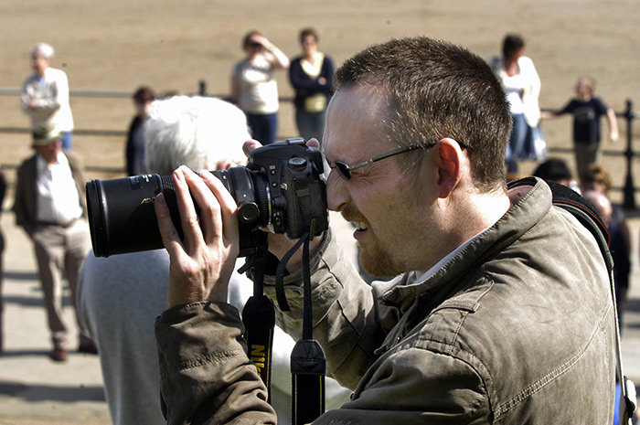 PHOTOJOURNALIST... Scarborough Evening News reporter Ian Duncan covering the scooter rally in 2007. Picture: Dave Barry