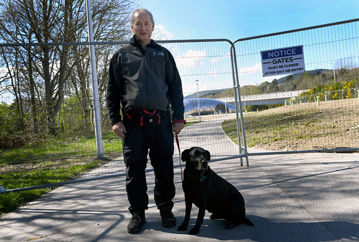 OBSTRUCTION... Duncan Henderson who is unhappy that the fencing at Whin Park which restricts access to the area was still in place...