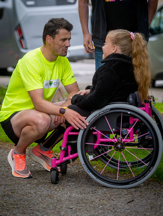 REUNION... Steven Mackay meets up with Pebbles Sawyer at the finishing line in Inverness...