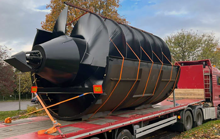 DELIVERY... One of the Archimedes Screws arrives at the site by the River Ness...