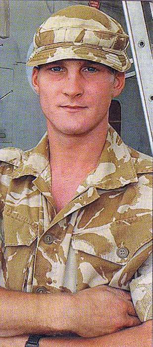 ELECTRICIAN... Sapper Alistair Smith who is helping to make life easier for servicemen and civilians...