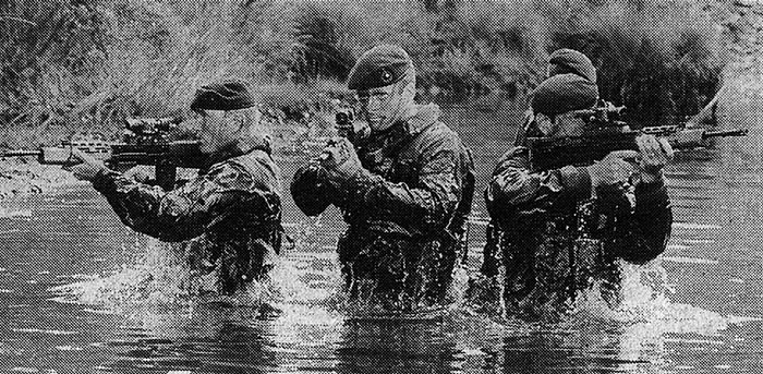 IN ACTION... Sgt David Silvester (centre) in an earlier operation...