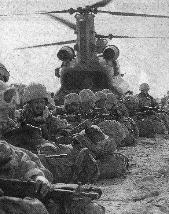 WAITING... Marines from 40 Commando waiting to be flown into Basra by Chinook helicopters...