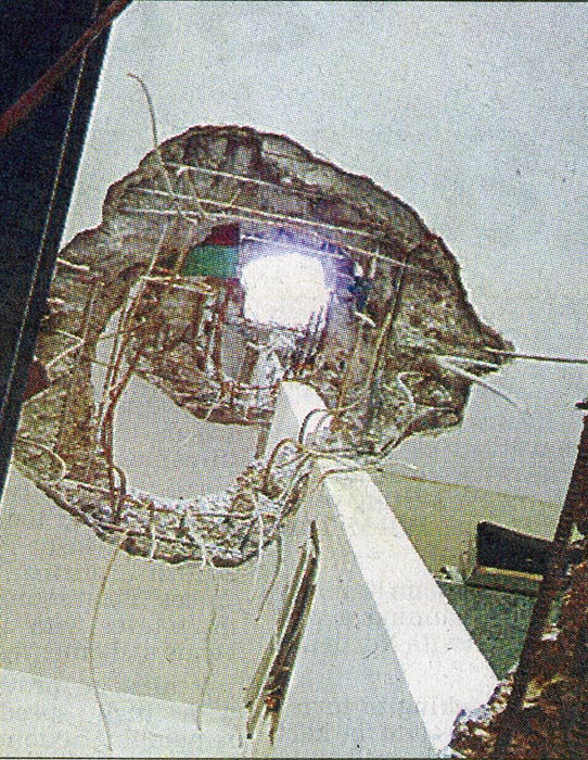 BOMB DAMAGE... One of Sgt Elsom's pictures shows how a bomb penetrated several floors of this building...
