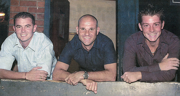 GLAD TO BE BACK... Andrew Locking (centre) with lan Pearson (left) and Ben Leaning at a welcome home from Iraq party at the Ferry Road Club Scunthorpe...