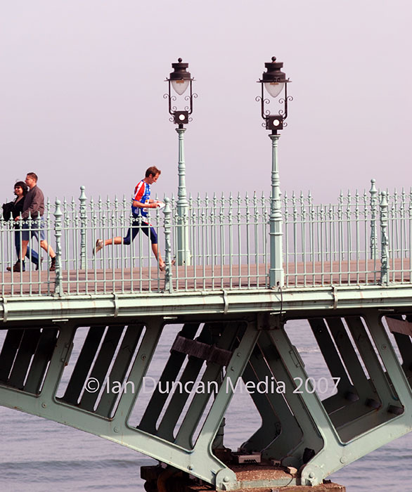 RUNNING THE ROUTE... A competitor crosses the Spa Bridge during the British orienteering championships in Scarborough...