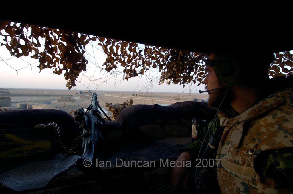 ON GUARD DUTY... A soldier at FOB Price scanning the horizon for enemy troops... 