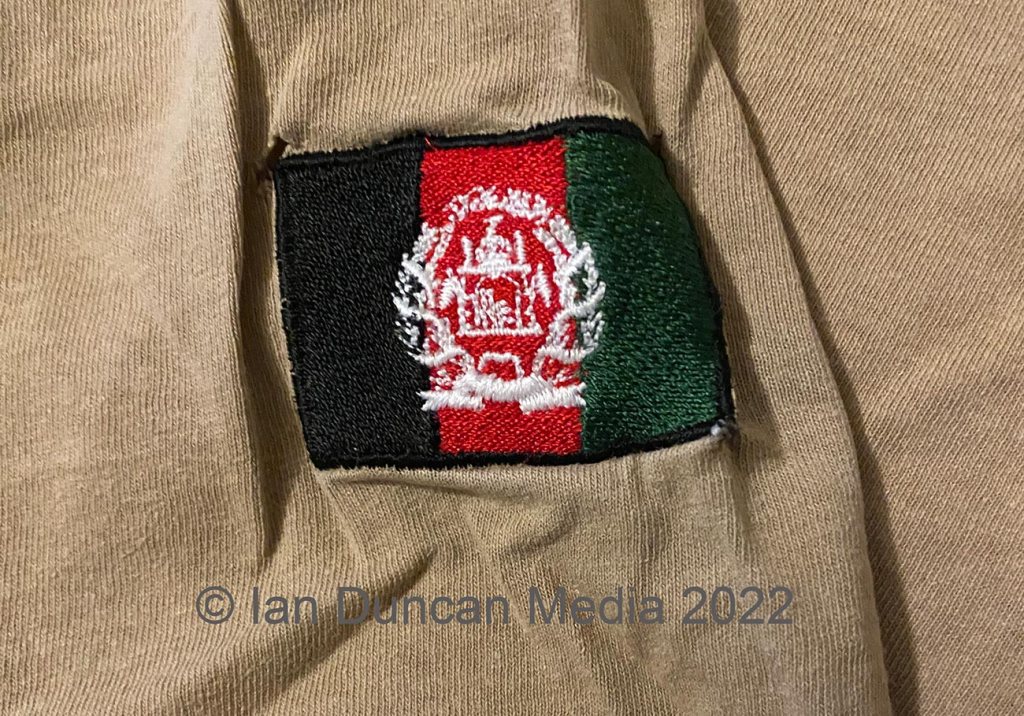 DETAIL... Afghanistan flag on the sleeve of the T-shirt...
