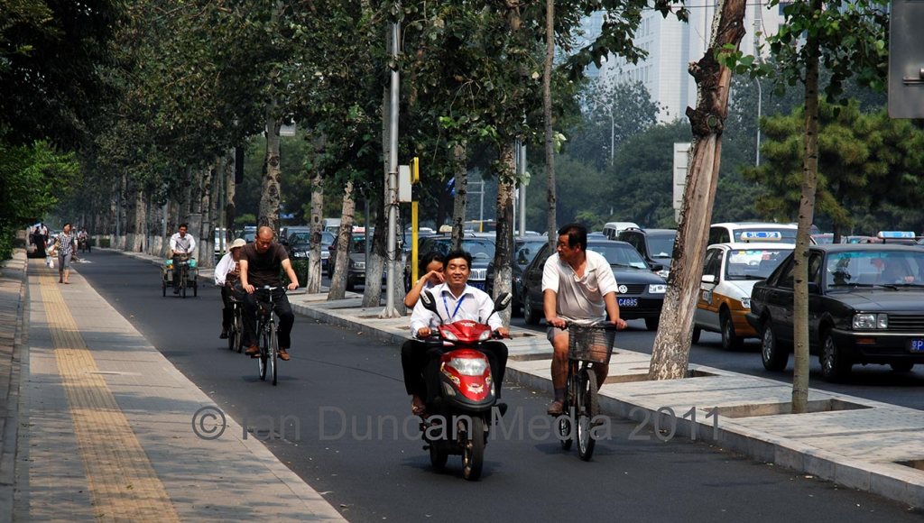 AROUND BEIJING… Traffic, bicycles and mopeds in Beijing in China…