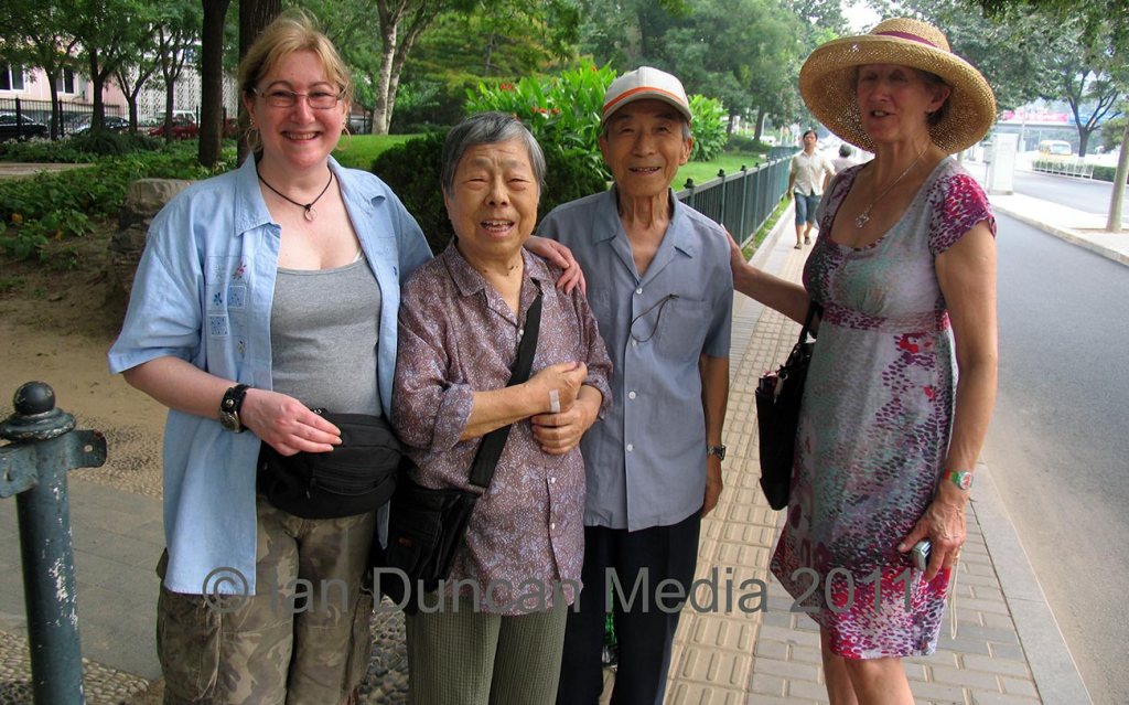 AROUND BEIJING... Karen Duncan, left, and fellow traveller Alison, Right, with a Chinese couple in Beijing in China...