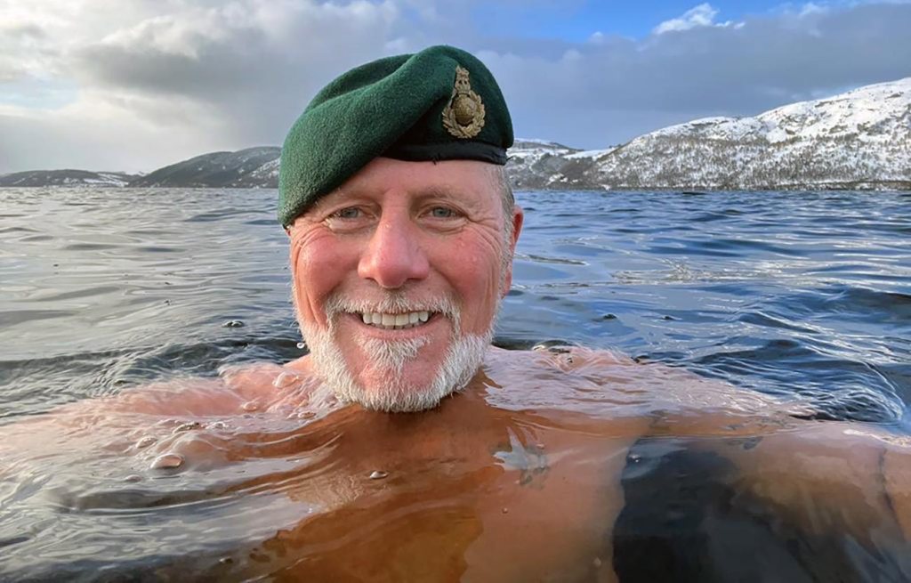 COLD DIP COMMANDO... Former Royal Marine Tim Crossin takes the plunge at Dores at the north end of Loch Ness...
