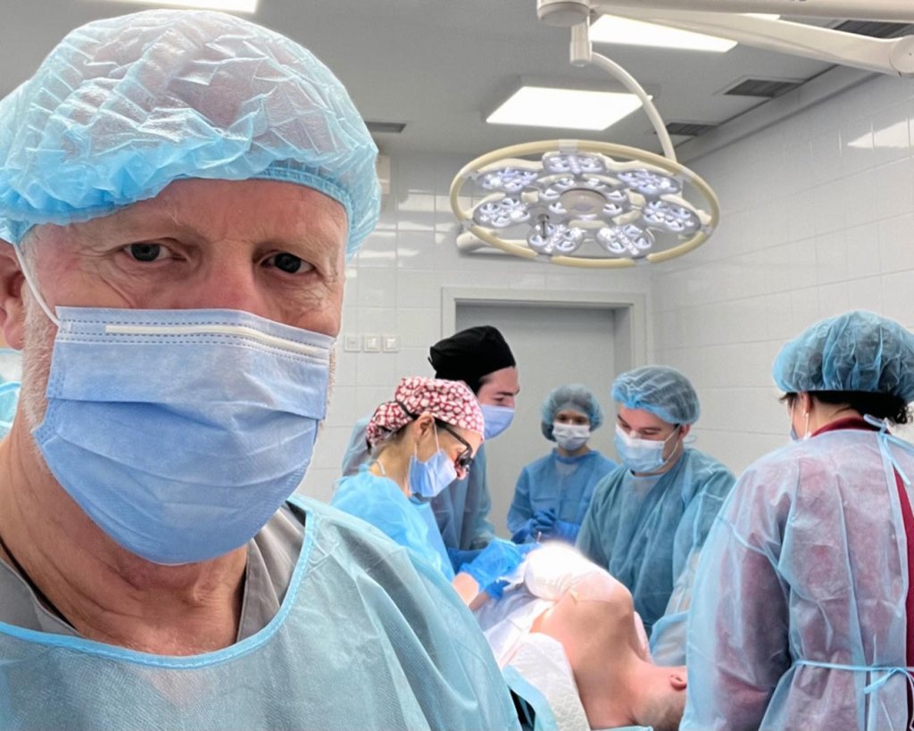 SURGEON... Andy Kent at work in an operating theatre in Ukraine...