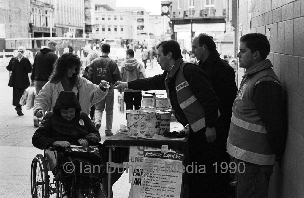 INDUSTRIAL ACTION... Ambulance workers canvas support in Newcastle city centre in 1990...