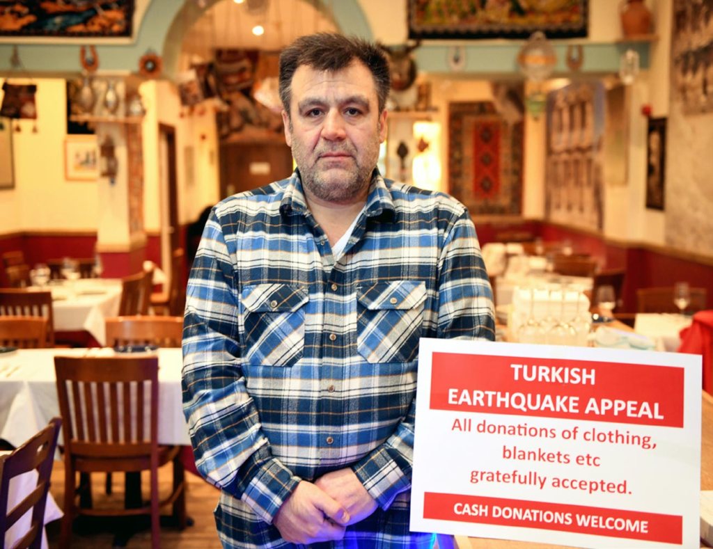 APPEAL... Mustafa Calisir of Aspendos is doing what he can to help the earthquake relief effort...