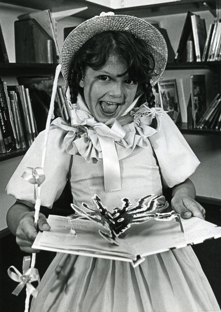 LIBRARY FUN... Bo Peep – six-year-old Jennifer – meets the spider that frightened Little Miss Muffet when she visited the newly-opened library at Greengate Infants School, Barrow. Statt and pupils celebrated the library's opening by dressing up as their favourite literary characters...