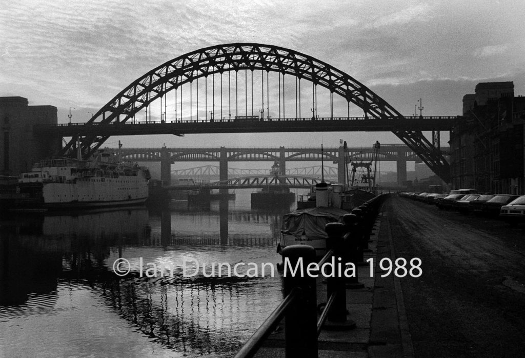 ATMOSPHERE... The four bridges across the River Tyne. The Tyne Bridge as seen from the Newcastle quayside...