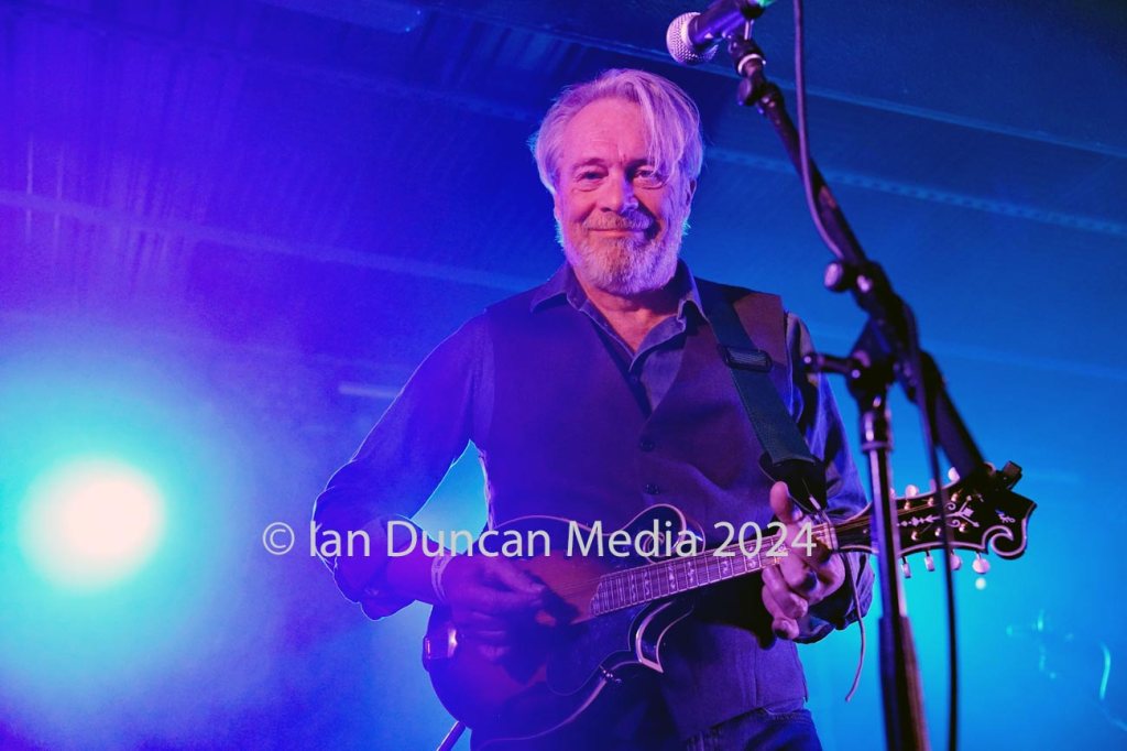 THE MEN THEY COULDN'T HANG... Songwriter Paul Simmonds (guitar, bouzouki, mandolin, keyboards)... Photo: Ian Duncan.