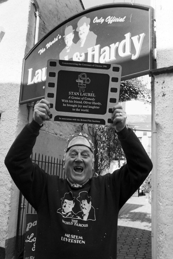 JOY TO THE WORLD... Laurel and Hardy Museum curator Bill Cubin with the commemorative plaque...
