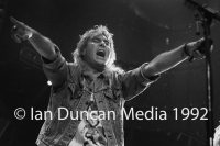 STRUTTING HIS STUFF... Def Leppard's Joe Elliott takes centre stage as the band, touring for the first time in three years, delight fans in their home city of Sheffield. Source: Ian Duncan.