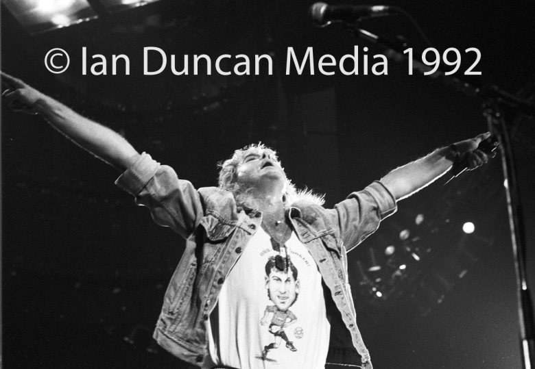 STRUTTING HIS STUFF... Def Leppard's Joe Elliott takes centre stage as the band, touring for the first time in three years, delight fans in their home city of Sheffield. Source: Ian Duncan.