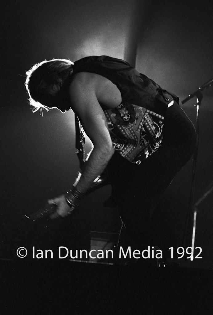 STRUTTING HIS STUFF... Def Leppard's Phil Collen takes centre stage as the band, touring for the first time in three years, delight fans in their home city of Sheffield. Source: Ian Duncan.