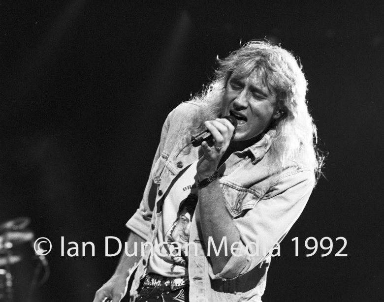 STRUTTING HIS STUFF... Def Leppard's Joe Elliott takes centre stage as the band, touring for the first time in three years, delight fans in their home city of Sheffield. Source: Ian Duncan.