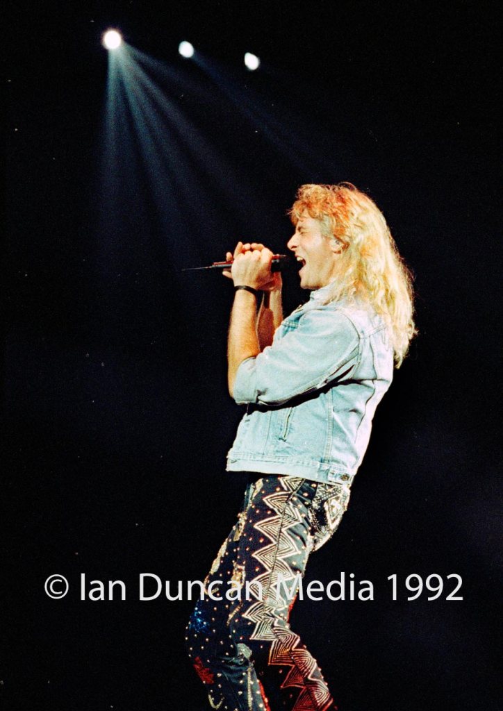 STRUTTING HIS STUFF... Def Leppard's Joe Elliott takes centre stage as the band, touring for the first time in three years, delight fans in their home city of Sheffield. Source: Ian Duncan.