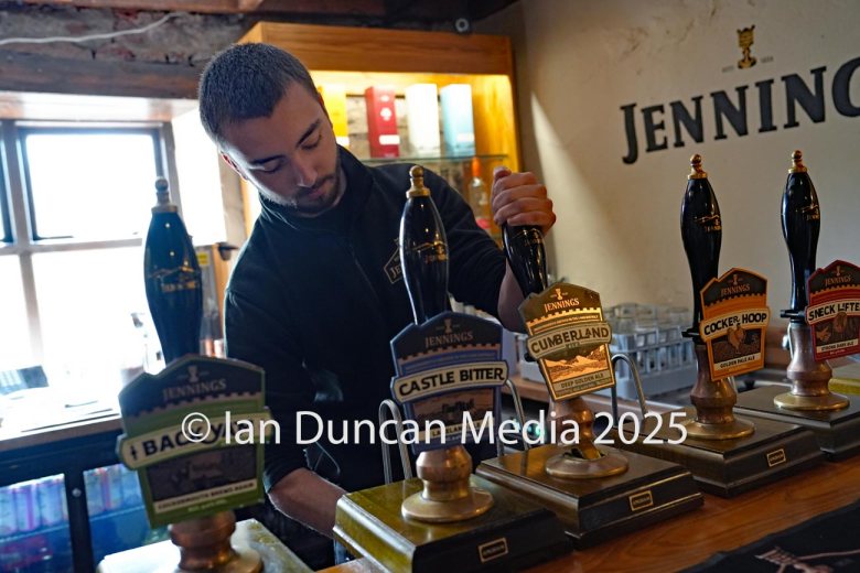 REVIVAL… Jennings Castle Brewery in Cockermouth… The brand was revived earlier this year and employs around 15 people… Barman Cohen Henry pulls a pint in the tap room… Picture: Ian Duncan