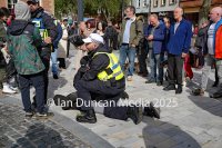 DEMONSTRATIONS... There were two opposing demos in Carlisle city centre on Saturday – one was pro-immigration and the other against it – which faced each other around the market Cross in English Street... Police with one of the anti-immigration protesters who charged the pro-immigration protesters...