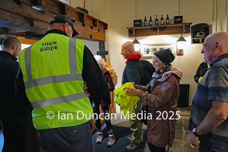 JENNINGS BREWERY... Tour guide Tom Speight, in cap, leads a tour of visitors around the site and the tour ended up in the taproom...