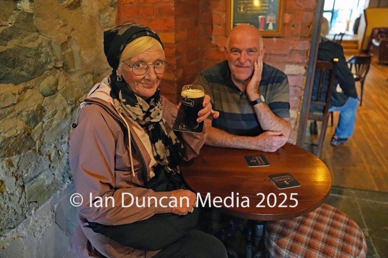 JENNINGS BREWERY... Tour guide Tom Speight, in cap, leads a tour of visitors around the site and the tour ended up in the taproom... A couple from Sunderland, he was from Newcastle Upon Tyne and she was from Sunderland, enjoy a drink after the tour...
