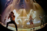 The fisheye shot of AC/DC in the tour programme from the For Those About To Rock tour in October 1982. Source: Uncredited.