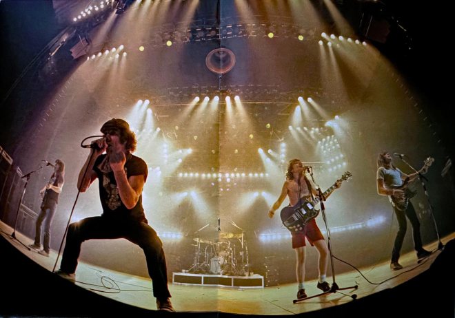 The fisheye shot of AC/DC in the tour programme from the For Those About To Rock tour in October 1982. Source: Uncredited.