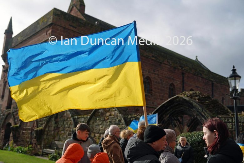 Ukrainian flag at Carlisle Cathedral ahead of the Vigil for Ukraine in the city centre to mark the fourth anniversary of the Russian invasion of Ukraine. Picture: Ian Duncan.